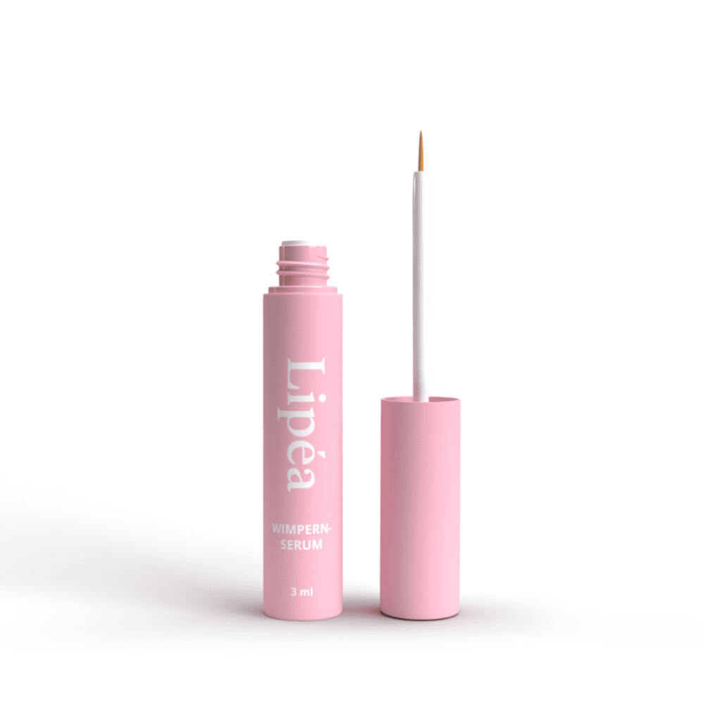 Wimpernserum mit Applikator auf weißem Hintergrund